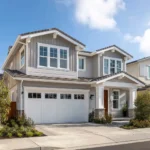 Freshly painted wood siding and trim on a modern California home exterior.